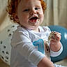 toddler, child, red_hair, cake, birthday, frosting, smiling, balloon, white_clothing, celebration, face, hand, messy, happy, indoors, sitting, cute, party, first_birthday, baby