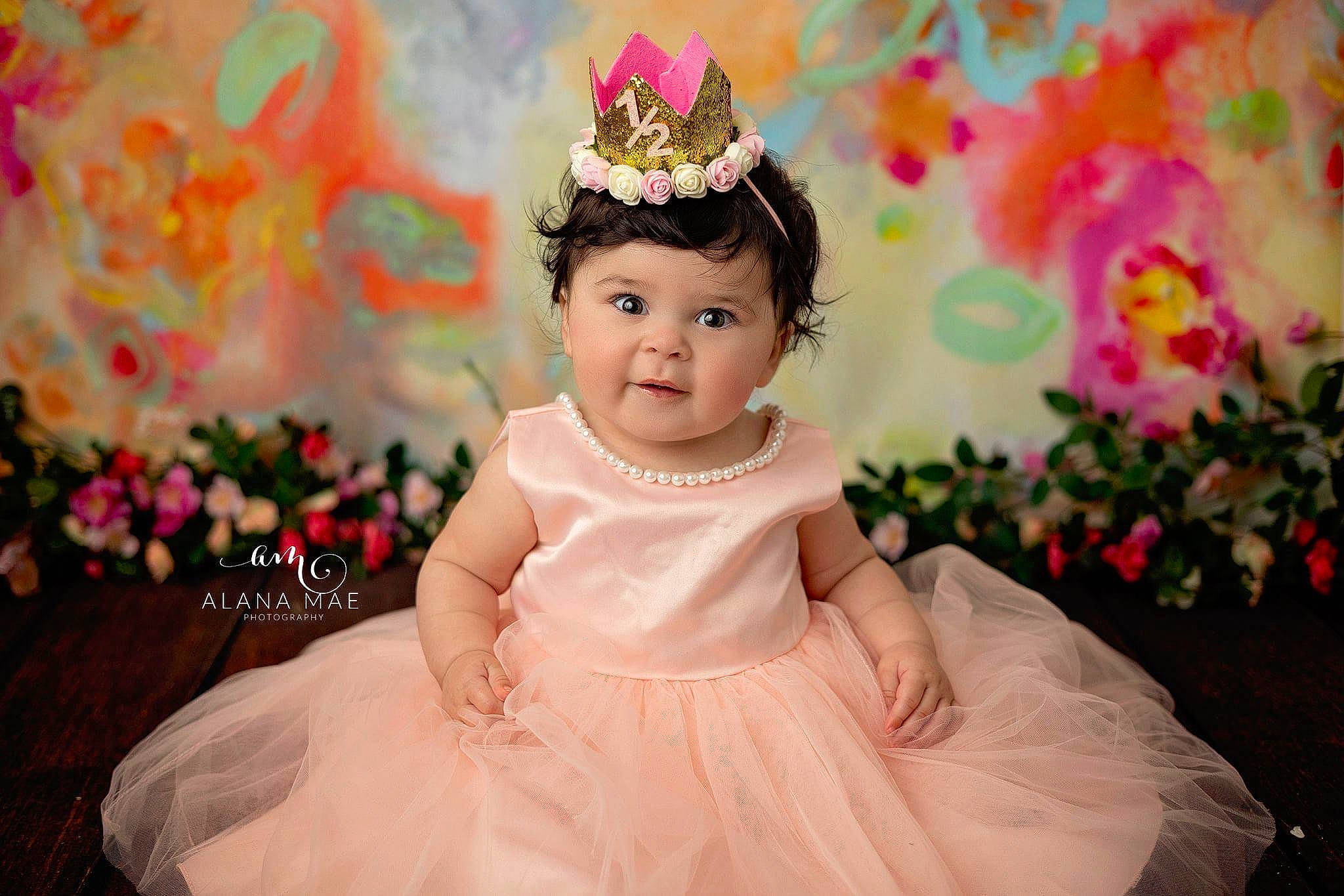 Vada is registered to the contest to win money with this photo: baby_toddler_clothing, bridal_accessory, bridal_clothing, bridal_party_dress, dress, embellishment, event, fashion_design, flash_photography, formal_wear, gown, hair, happy, headpiece, headwear, jewellery, person, petal, pink, plant