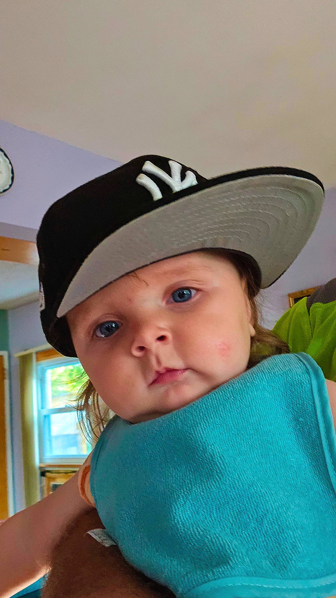 Sarah is registered to the contest to win money with this photo: baby, baby_products, baby_toddler_clothing, baseball_cap, cap, cheek, child, clock, cool, electric_blue, fashion_accessory, fun, happy, hat, headgear, headwear, lip, person, personal_protective_equipment, sun_hat