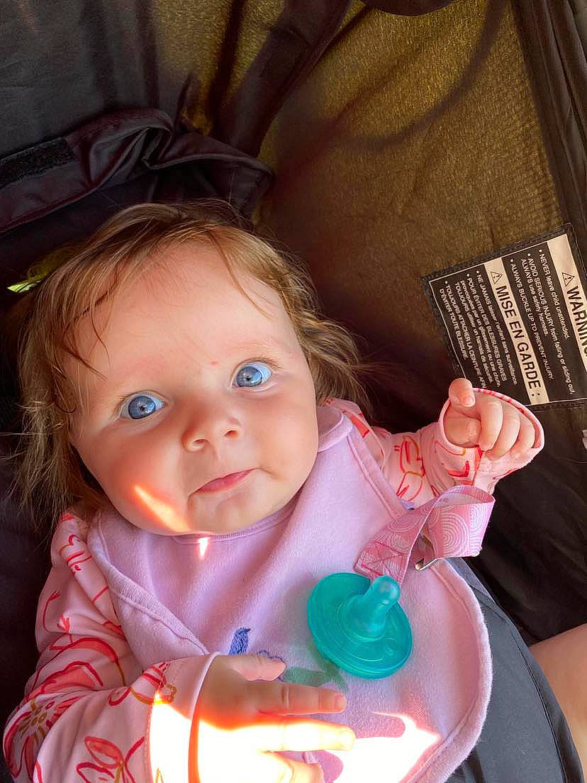 Sarah joined the competition — help win amazing prizes! baby, baby_products, baby_toddler_clothing, chair, cheek, child, drinkware, eyelash, finger, fun, hairstyle, happy, iris, lip, mouth, nose, person, sitting, skin, tableware