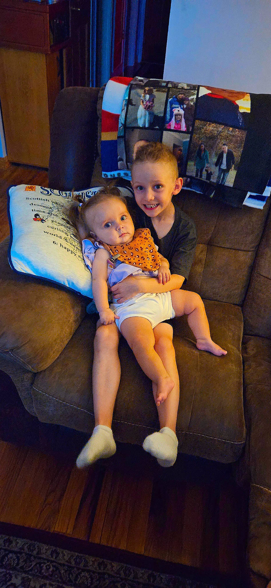 Andy joined the competition — help win amazing prizes! barefoot, child, couch, event, flooring, foot, fun, happy, human_leg, joy, lap, leisure, mammal, person, sandal, shorts, sitting, skin, smile, t_shirt