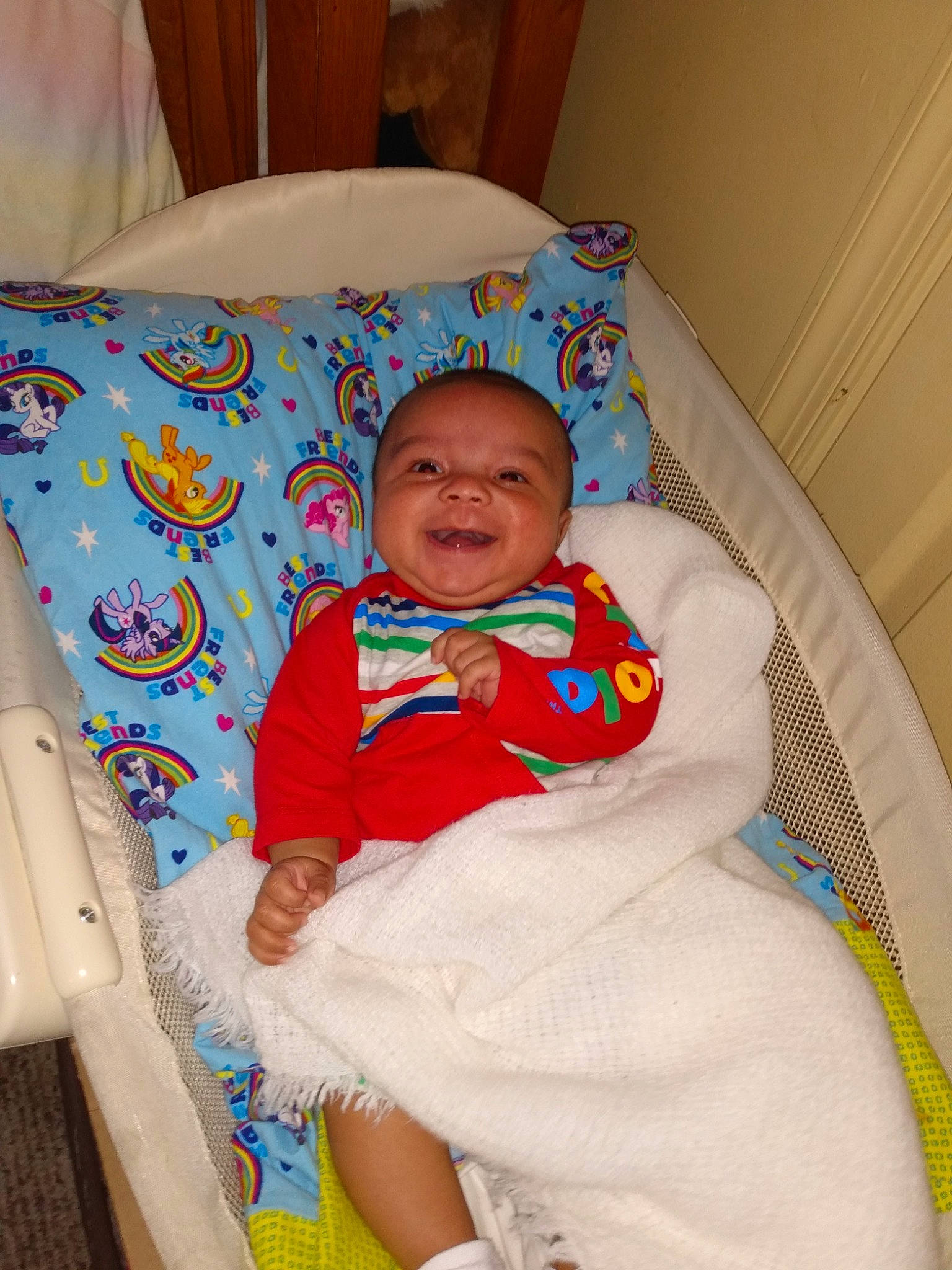 Jaylin is registered to the contest to win money with this photo: baby, baby_products, baby_safety, baby_toddler_clothing, chair, child, comfort, couch, facial_expression, infant_bed, linens, pattern, person, room, sitting, sleeve, smile, t_shirt, throw_pillow, toddler