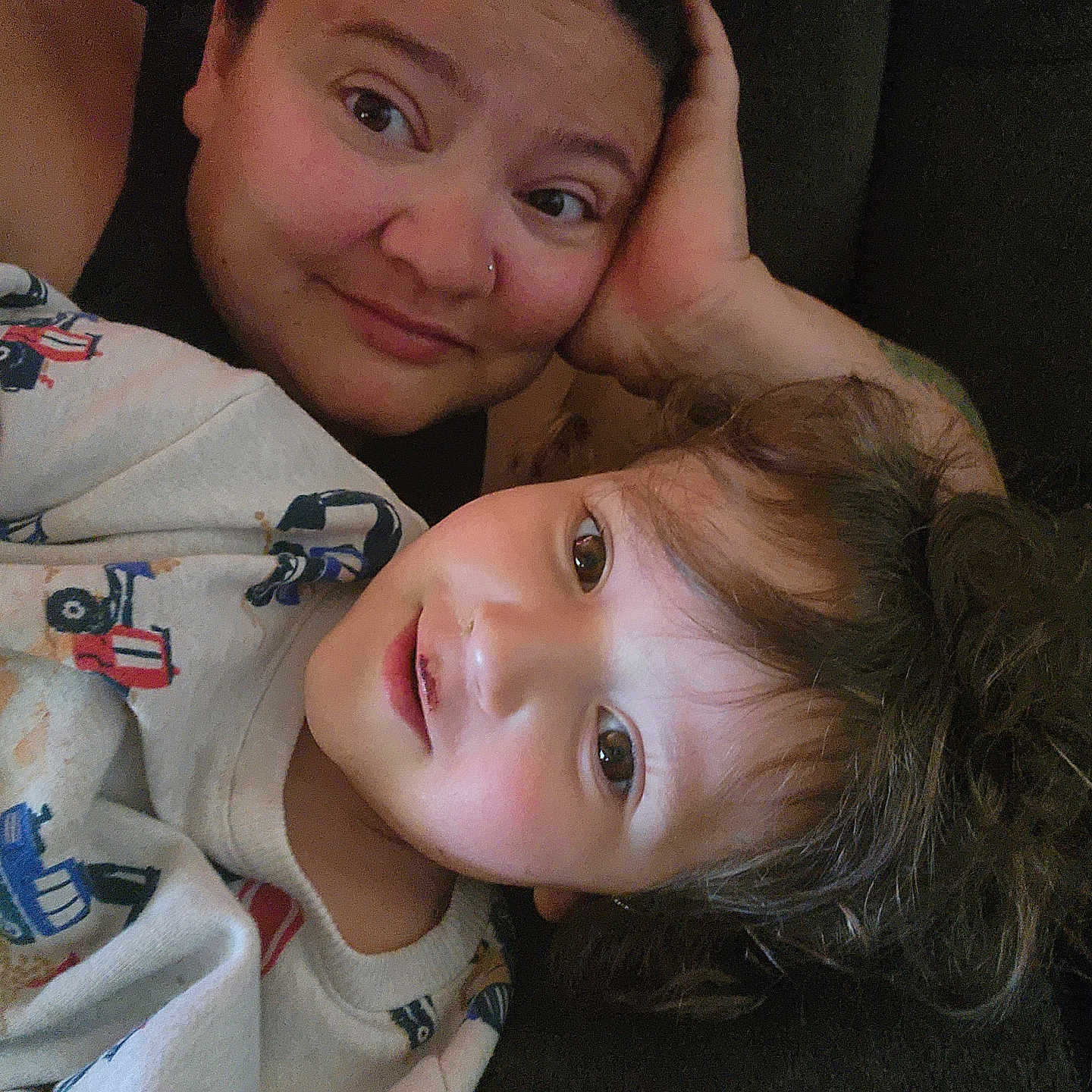Leah joined the competition — help win amazing prizes! adult, child, smiling, face, person, couch, sweatshirt, clothing, indoor, closeup, portrait, happy, relaxed, family, toddler, casual, cozy, hair, skin, expression