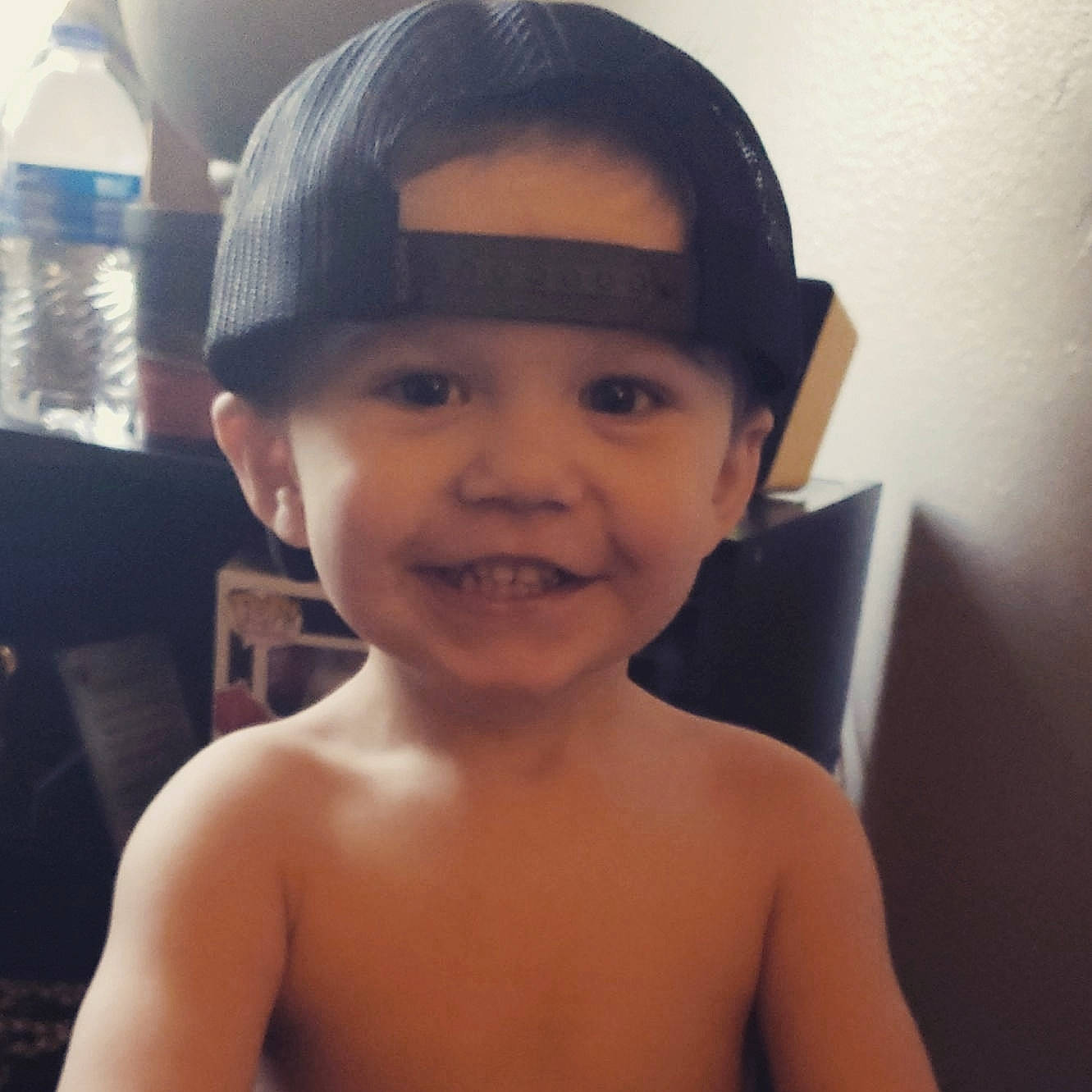 Logan is registered to the contest to win money with this photo: baby, barechested, beauty, cheek, child, chin, cool, eye, eyebrow, face, forehead, hair, head, joy, lip, muscle, nose, person, selfie, skin