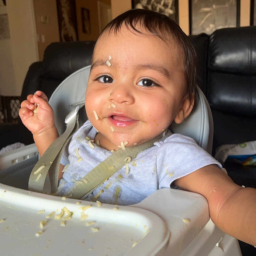 Jasiah joined the competition — help win amazing prizes! baby, bodypart, chair, couch, cream, cutlery, dessert, face, finger, food, fork, furniture, hand, head, icecream, icing, person, photography, portrait, spoon