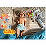 baby, bed, blanket, bonnet, bottle, clothing, cushion, diaper, face, furniture, happy, hat, head, homedecor, person, photography, portrait, shorts, sitting, smile