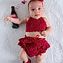 baby, infant, red_clothing, crochet, headband, shoes, coca_cola_bottle, straw, blanket, lying_down, cute, portrait, child, drink, accessory, white_background, expression, small_hands, small_feet, indoors