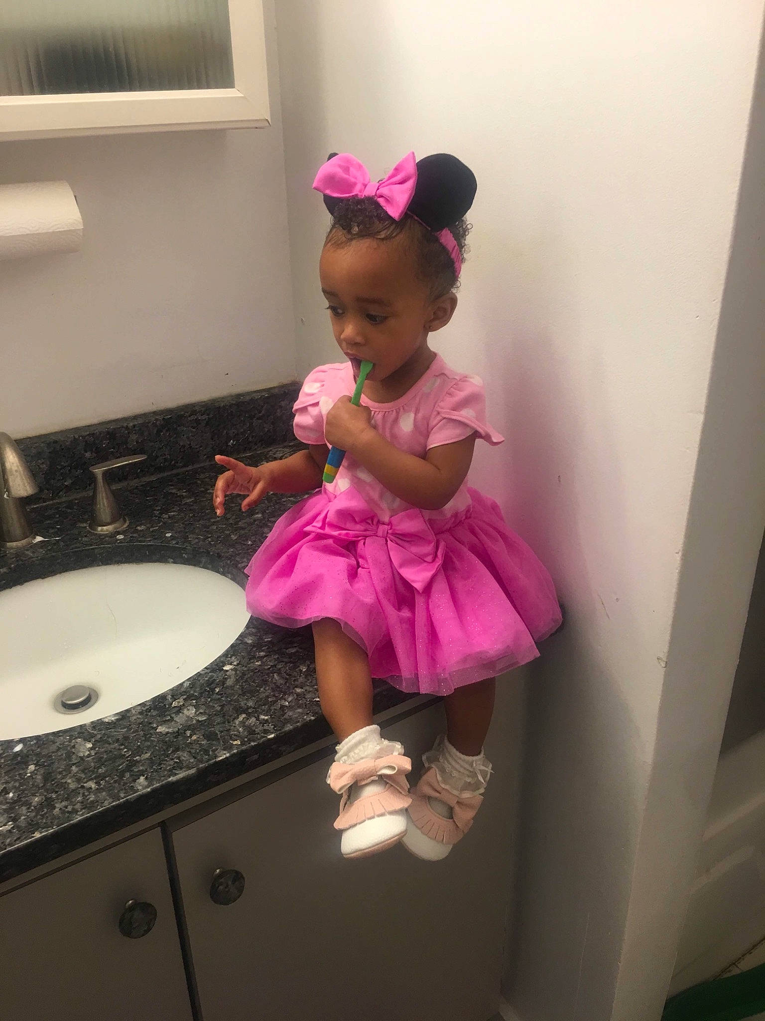 Joselyn is registered to the contest to win money with this photo: bathroom, child, costume, dress, fun, person, pink, room, skin, toddler