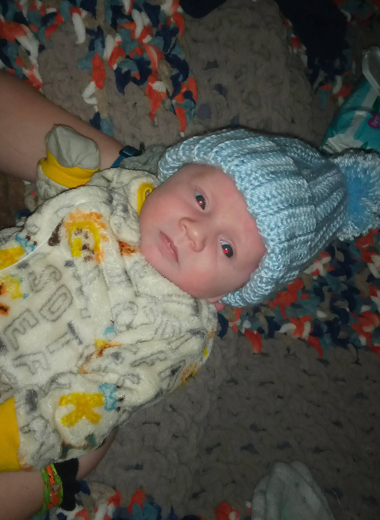 Landyn joined the competition — help win amazing prizes! baby, baby_toddler_clothing, carmine, cheek, child, comfort, headwear, linens, pattern, person, sitting, toddler