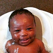 Ci'Re joined the competition — help win amazing prizes! baby, bath, bubbles, smile, happy, water, soap, skin, face, head, child, infant, cute, tub, wet, joyful, playful, person, portrait, young