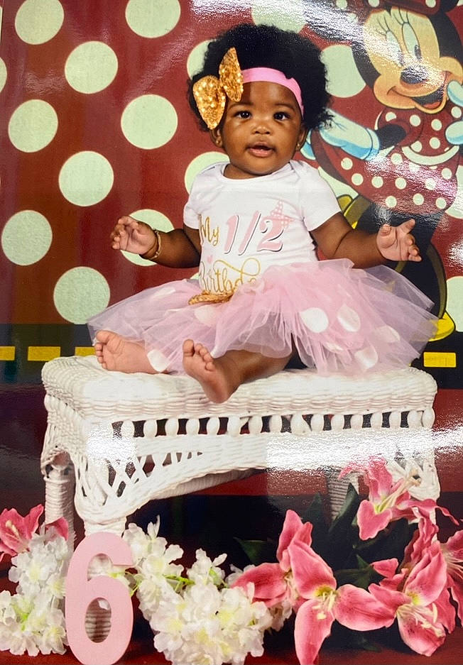 Riley joined the competition — help win amazing prizes! baby, baby_toddler_clothing, baked_goods, birthday, cake_decorating, cake_decorating_supply, child, entertainment, event, flower_arranging, happy, hat, headwear, icing, magenta, party_supply, person, petal, pink, sugar_cake