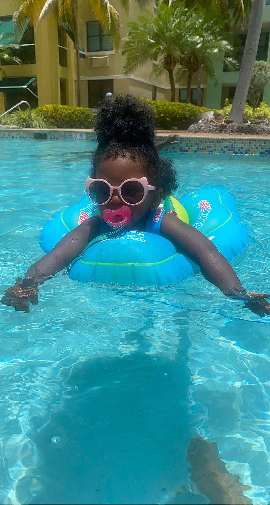 Riley is registered to the contest to win money with this photo: aqua, azure, brassiere, diving_equipment, eyewear, fun, goggles, leisure, outdoor_recreation, person, personal_protective_equipment, recreation, sunglasses, swimmer, swimming_pool, swimwear, underwater, underwater_diving, vertebrate, vision_care