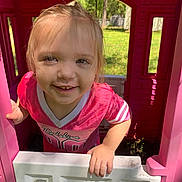Chloe joined the competition — help win amazing prizes! architecture, baby, blonde, building, clothing, face, grass, head, nature, outdoorplayarea, outdoors, park, person, photography, plant, playarea, portrait, purple, shelter, t_shirt
