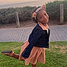 child, girl, smiling, portrait, outdoor, ocean, sea, sunset, sky, grass, park, seaside, coast, dress, jacket, headband, bear_ears, shoes, posing, happy