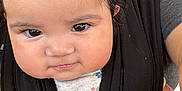 Helena is registered to the contest to win money with this photo: adult, baby, black, butterfly, carrier, cheeks, child, closeup, clothing, cute, eyes, face, hair, holding, human, infant, pattern, person, portrait, skin