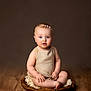 baby, child, infant, portrait, sitting, wooden_floor, wooden_bowl, headband, pearl, beige_outfit, studio, neutral_background, cute, curious, indoors, hands, feet, skin, face, blue_eyes