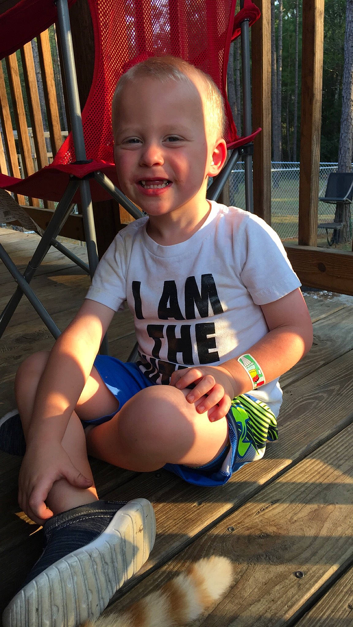 Trace joined the competition — help win amazing prizes! baby, child, facial_expression, fun, joy, leg, person, play, sitting, skin, smile, summer, t_shirt, toddler, tree, vacation