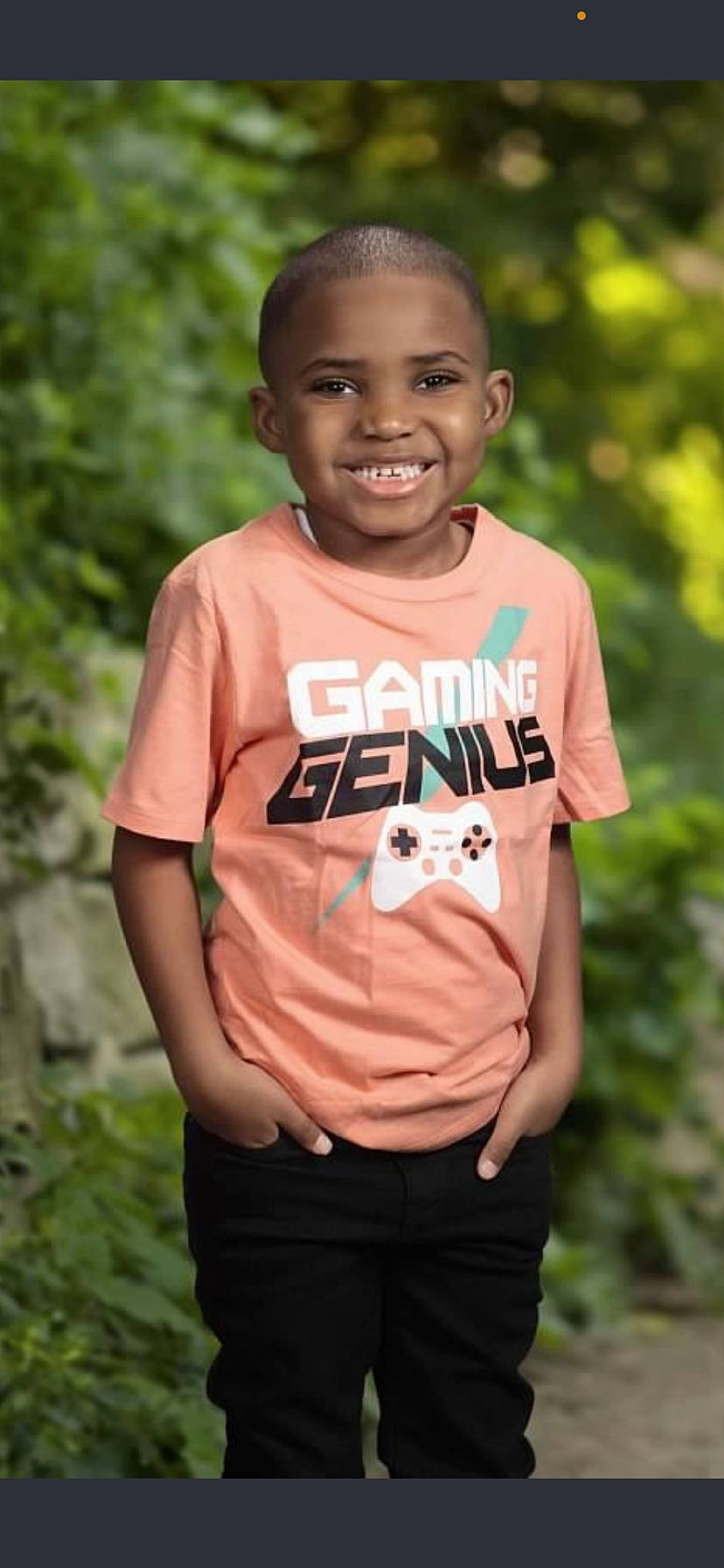 Jace is registered to the contest to win money with this photo: active_shirt, child, eye, face, facial_expression, forehead, fun, grass, hair, happy, joy, leisure, neck, pattern, people_in_nature, person, recreation, shoulder, sleeve, smile