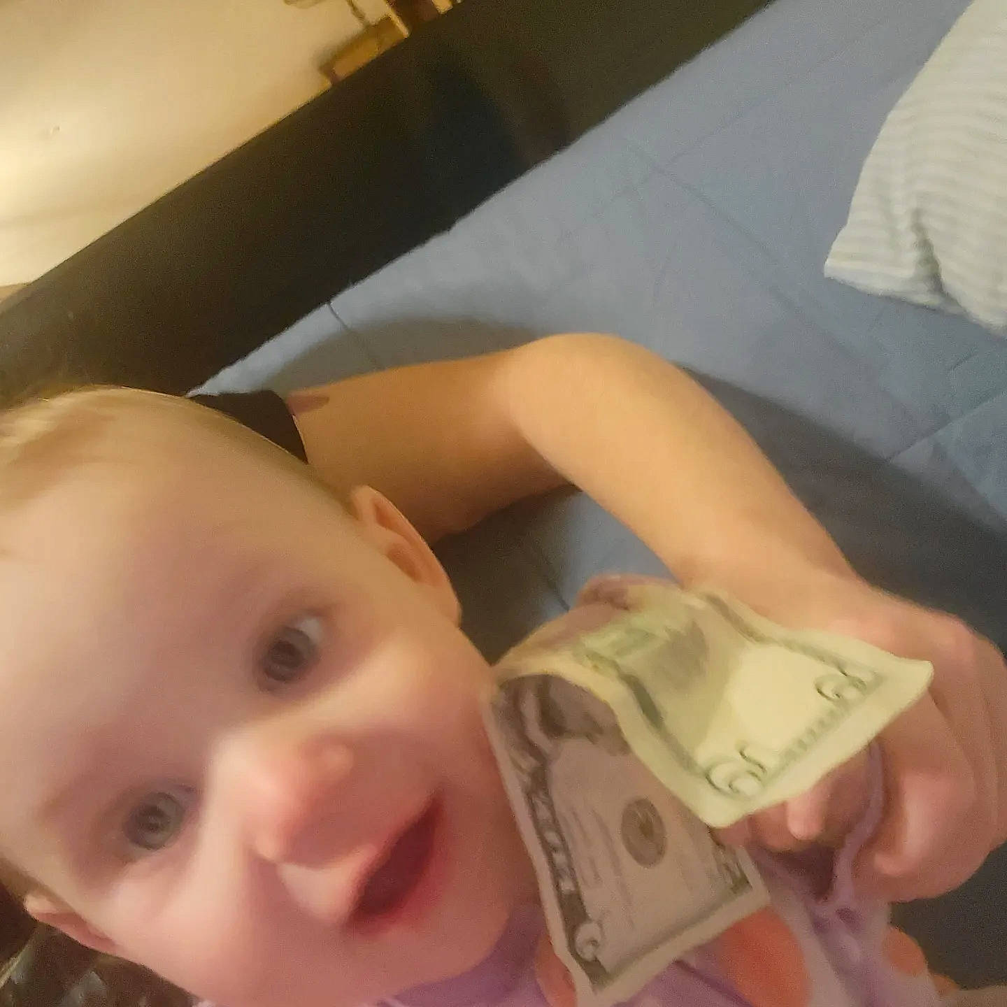 Haylee is registered to the contest to win money with this photo: baby, banknote, cash, cheek, child, chin, comfort, eyebrow, eyelash, finger, fun, happy, head, money_handling, mouth, nose, person, product, skin, smile