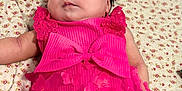 Cattleya is registered to the contest to win money with this photo: baby, infant, pink_clothing, headband, flower, butterflies, blanket, patterned_blanket, cute, chubby_cheeks, laying_down, soft_lighting, indoor, portrait, child, young_baby, adorable, face, person, resting