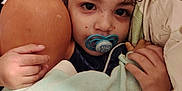 Esteban participe au concours pour gagner de l'argent avec cette photo : baby, bedtime, blanket, child, comfort, cozy, cuddle, doll, face, hand, indoor, pacifier, person, portrait, rest, sleep, sleepy, soft, warm, young