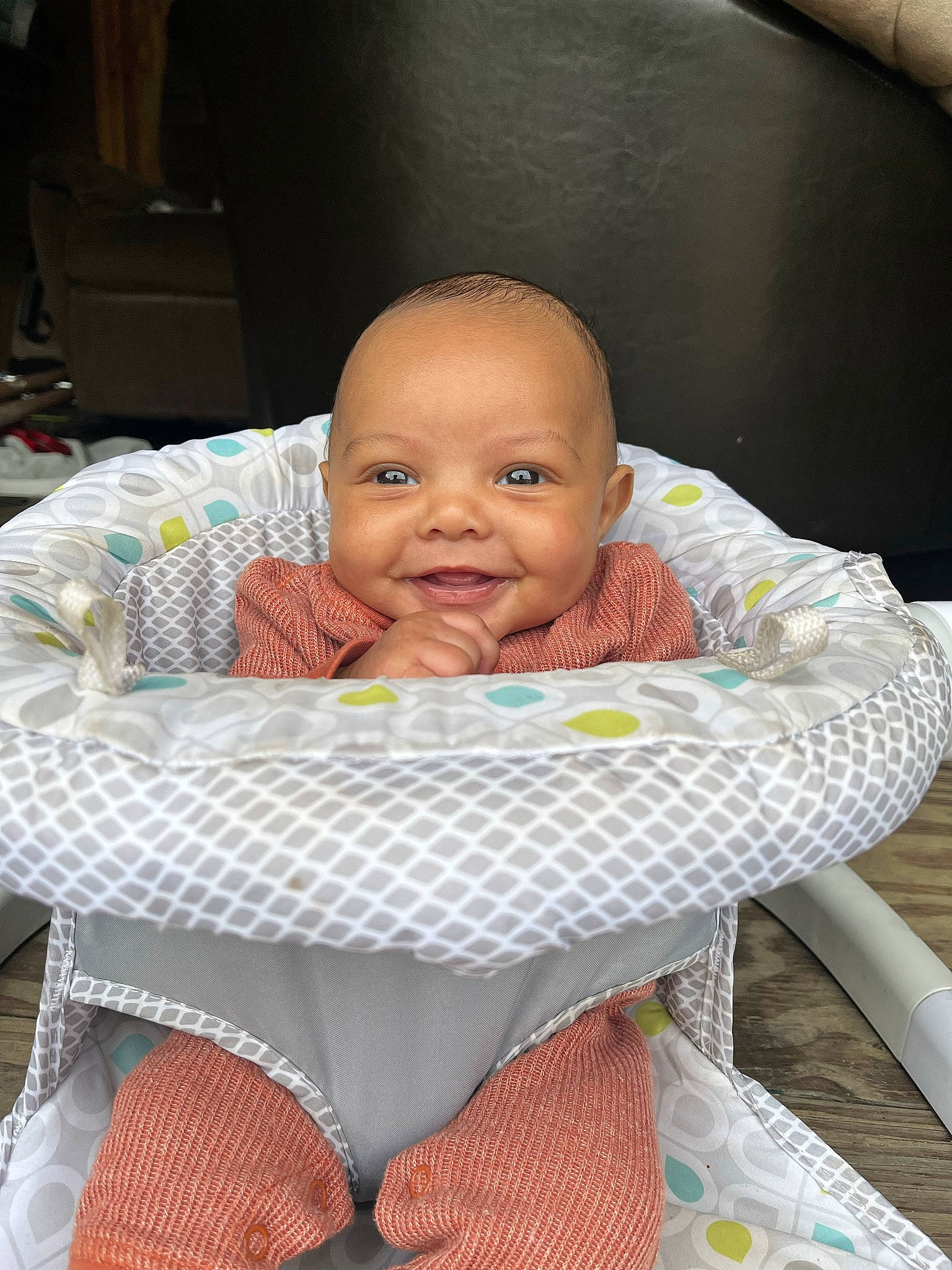 Karsyn is registered to the contest to win money with this photo: baby, baby_products, baby_toddler_clothing, chair, cheek, child, comfort, event, eye, joy, linens, pattern, person, room, sitting, sleeve, smile, table, tablecloth, textile