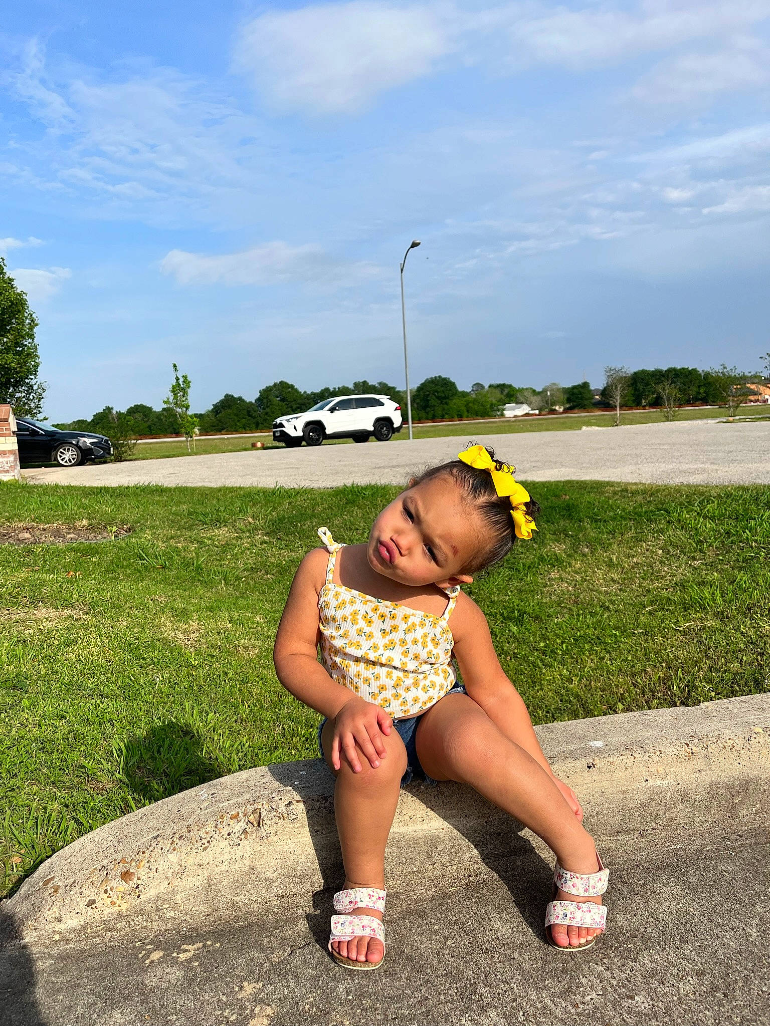 Adaline joined the competition — help win amazing prizes! asphalt, cloud, footwear, grass, grass_family, happy, hat, landscape, leisure, people_in_nature, person, plant, recreation, road_surface, shorts, sidewalk, sky, street_light, thigh, toddler