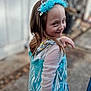 child, girl, blue_dress, princess_costume, headband, smile, playful, outdoor, portrait, young, fashion, person, costume, happy, cute, face, fun, posing, celebration, childhood