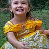 Georgia Deann is registered to the contest to win money with this photo: child, girl, toddler, smiling, grinning, portrait, outdoor, garden, forest, nature, yellow_dress, costume, princess, satin, lace, jewelry, hair_accessory, seated, happy, face