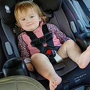Americus Leighann is registered to the contest to win money with this photo: toddler, child, car_seat, safety_harness, smiling, foot, pink_clothing, floral_pattern, seatbelt, car_interior, baby, cute, strapped_in, portrait, young_child, seat, travel, child_safety, happy, infant