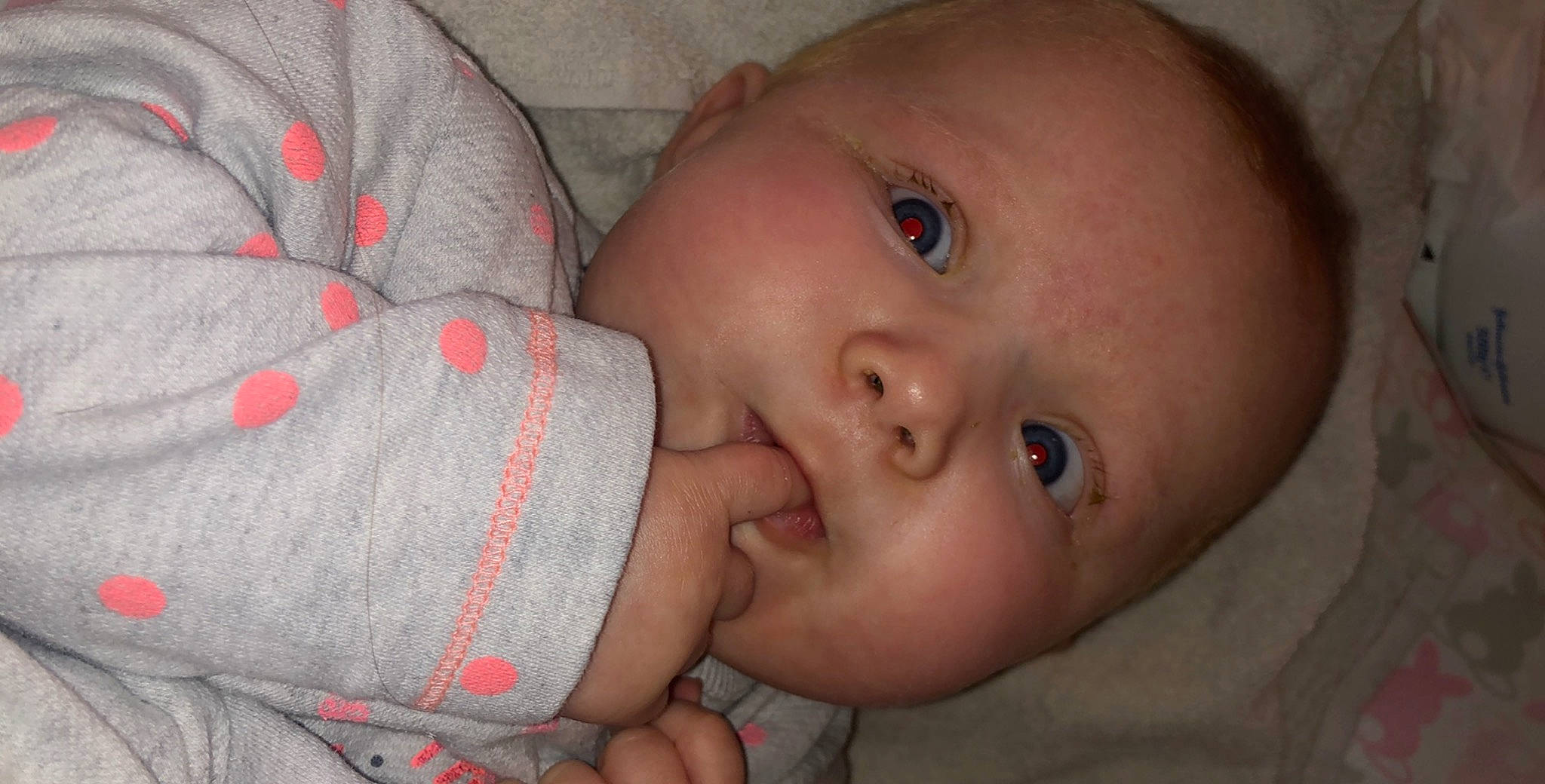 Sawyer participe au concours pour gagner de l'argent avec cette photo : baby, bedtime, cheek, child, chin, ear, eye, eyebrow, face, finger, forehead, hand, head, iris, lip, mouth, nose, organ, person, skin