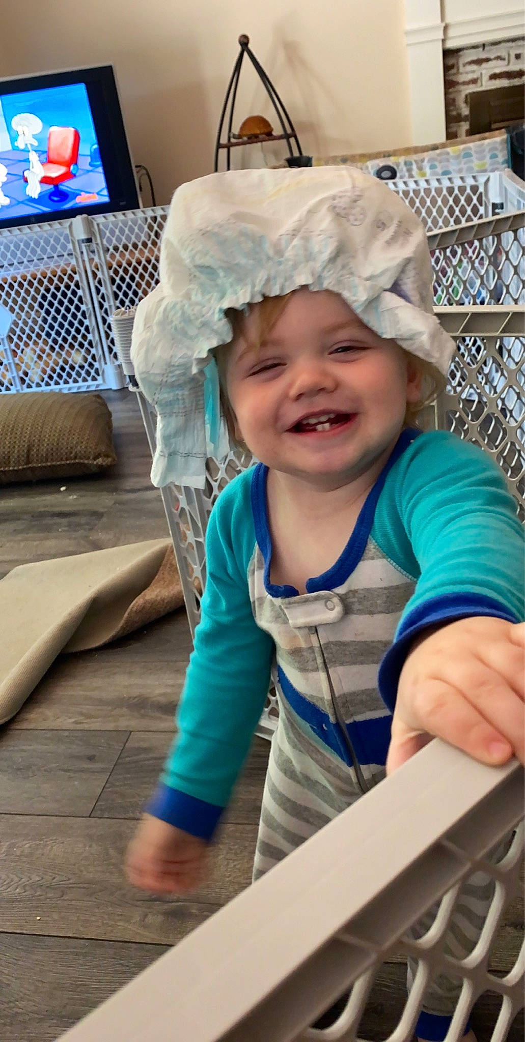 Cason is registered to the contest to win money with this photo: baby, child, facial_expression, fun, head, headgear, headwear, joy, laugh, person, play, sitting, smile, toddler, vacation