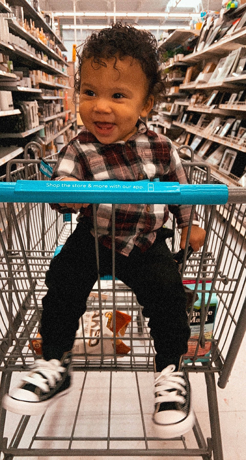 Kellen joined the competition — help win amazing prizes! bicycle_tire, black, child, customer, happy, human, leg, outerwear, person, photograph, shelf, shoe, shopping, shopping_cart, smile, snapshot, sneakers, standing, toddler, wheel
