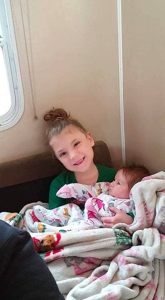 Savanna is registered to the contest to win money with this photo: air_travel, baby, baby_products, baby_toddler_clothing, bedding, child, comfort, fun, happy, joy, lap, linens, person, room, sitting, skin, smile, toddler, vacation, window