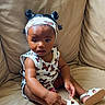 Emerie joined the competition — help win amazing prizes! baby, child, infant, girl, sitting, couch, leather, footwear, sandal, headband, butterfly_pattern, clothing, curious, indoors, skin, puffs, small_hands, expression, casual, comfortable