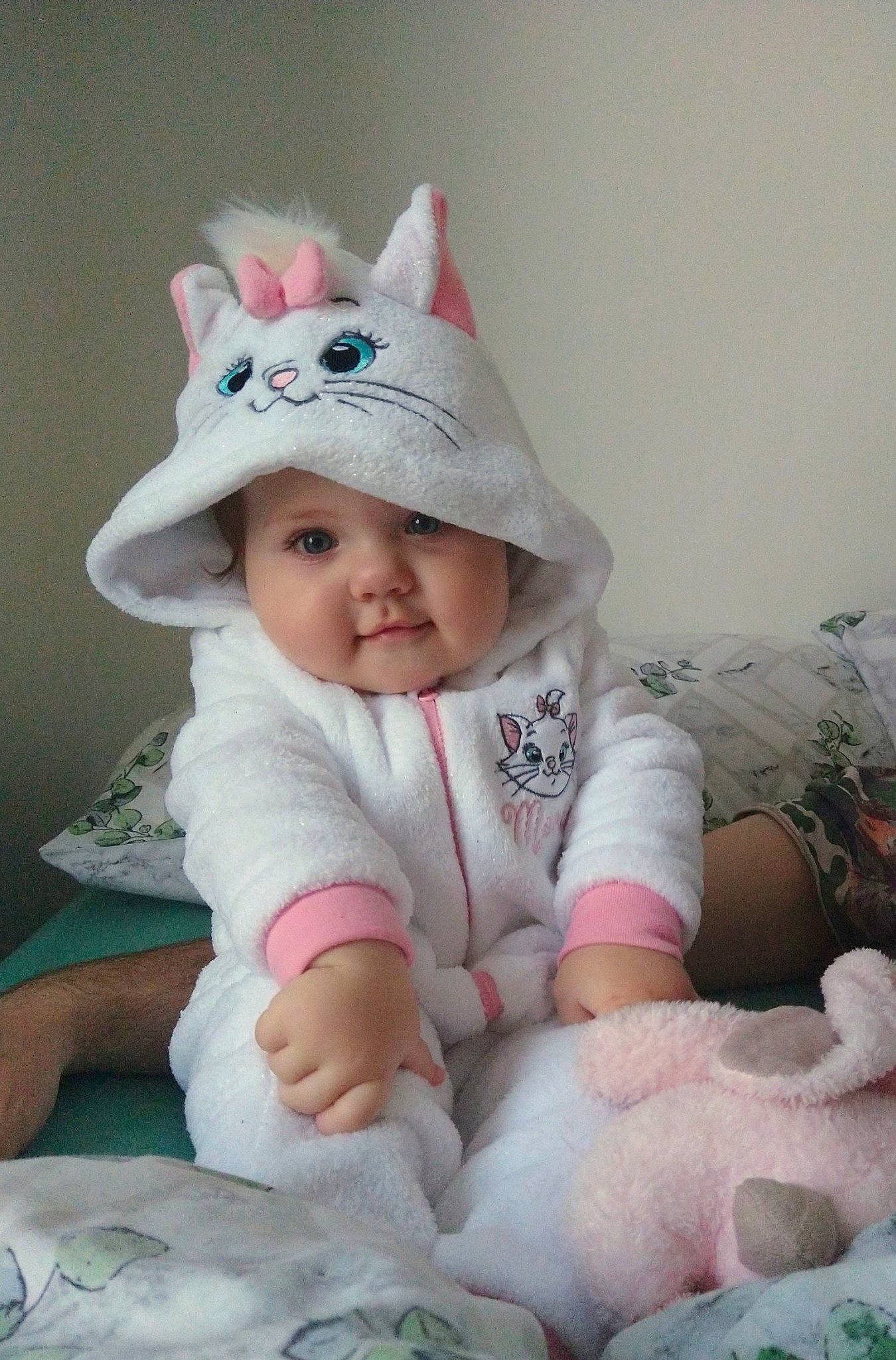 Hanna is registered to the contest to win money with this photo: baby, baby_toddler_clothing, cap, cheek, child, comfort, eye, face, happy, head, headgear, headwear, iris, linens, lip, outerwear, person, pink, skin, sleeve