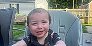 Aidan joined the competition — help win amazing prizes! backyard, child, clothing, daylight, food, grass, happy, high_chair, macaroni_and_cheese, outdoor, person, plastic_spoon, seat, shed, short_sleeve, smiling, sunny, table, toddler, trees