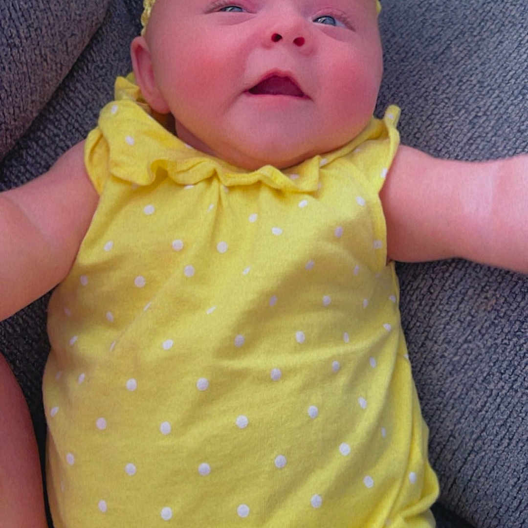 Roselynn is registered to the contest to win money with this photo: baby, bed, blanket, bonnet, cap, clothing, couch, cushion, dress, face, furniture, glove, hat, head, homedecor, newborn, person, photography, portrait, sleeping