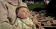 Leonard joined the competition — help win amazing prizes! woman, baby, blanket, glasses, smile, outdoor, night, quilt, grass, people, trees, child, portrait, happy, sitting, face, clothing, warm, family, event