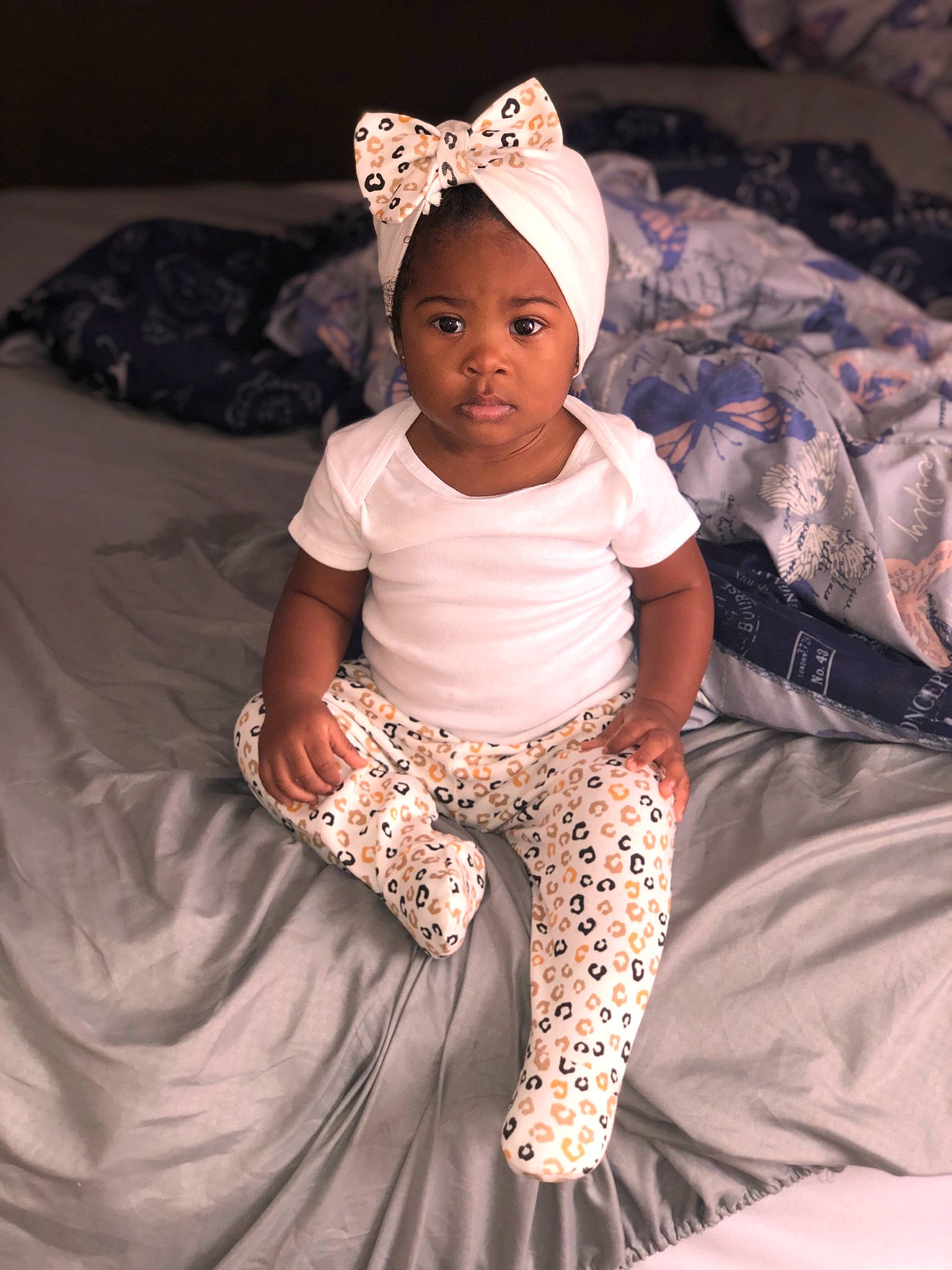 Jayla joined the competition — help win amazing prizes! baby, baby_toddler_clothing, cap, child, comfort, cool, event, eye, flash_photography, fun, happy, headgear, human_body, pattern, person, pink, purple, sleeve, t_shirt, textile