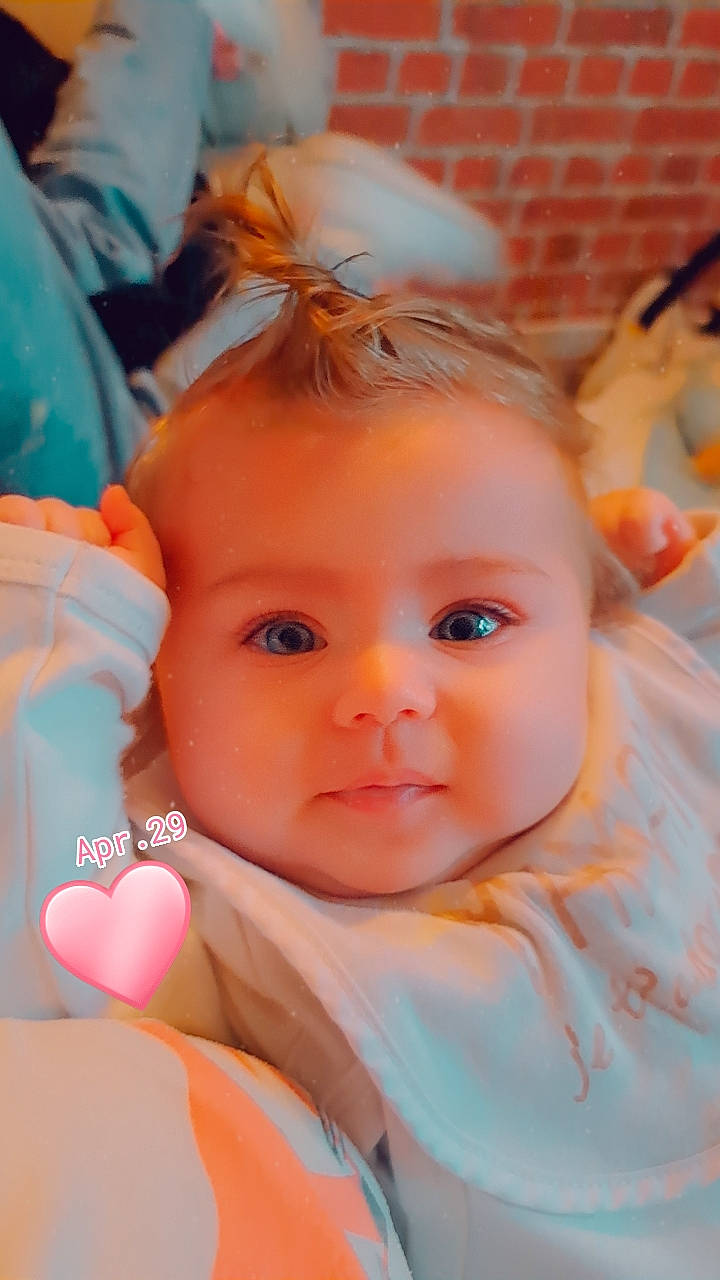 Allya participe au concours pour gagner de l'argent avec cette photo : azure, baby, baby_toddler_clothing, cheek, child, chin, eyebrow, eyelash, facial_expression, fun, hairstyle, happy, iris, lip, mouth, nose, orange, person, pink, skin