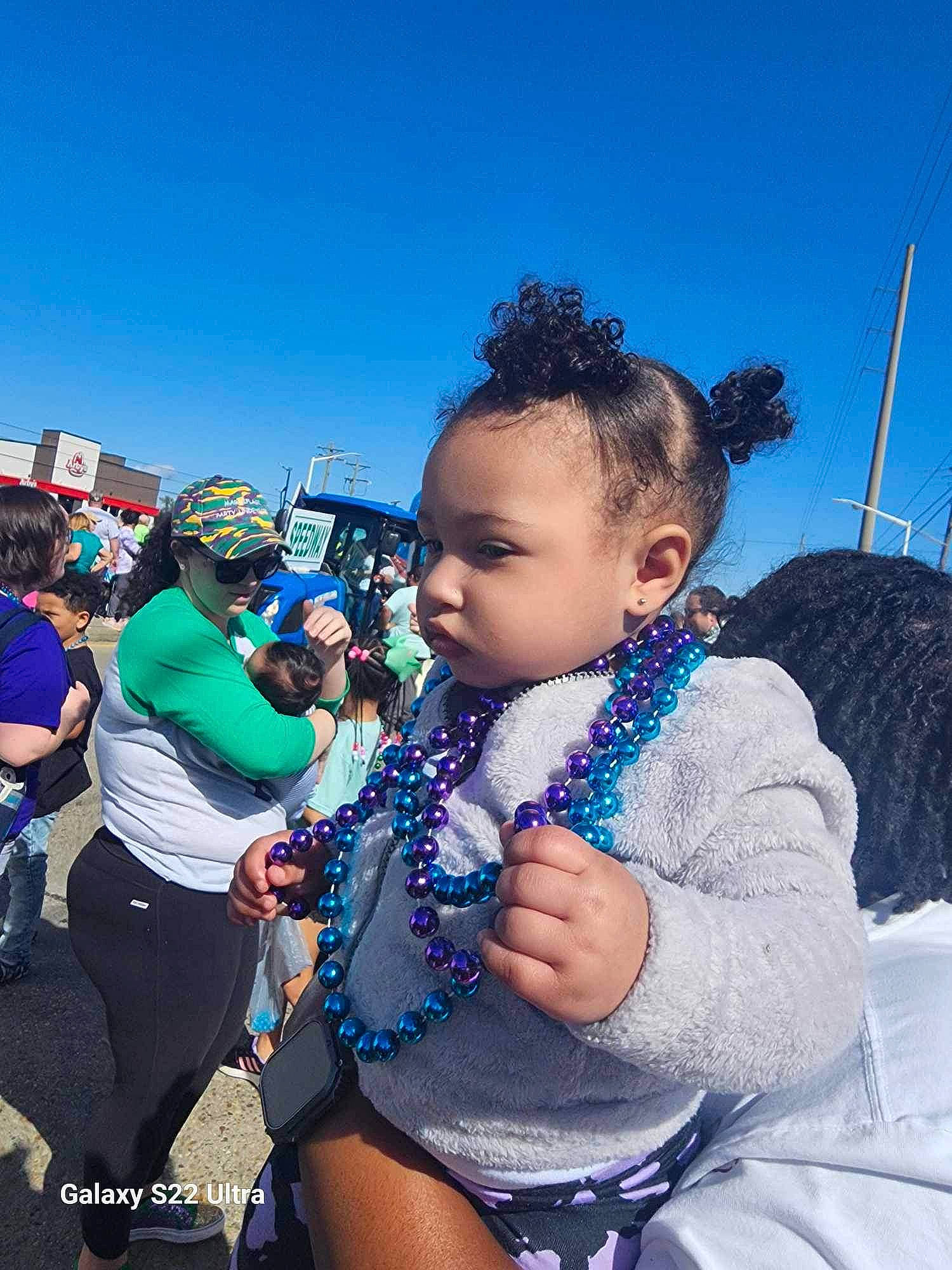 Tahani joined the competition — help win amazing prizes! abdomen, cloud, crowd, electric_blue, entertainment, event, eyewear, festival, fun, happy, jewellery, leisure, person, public_event, recreation, sky, thigh, toddler, tourism, tradition