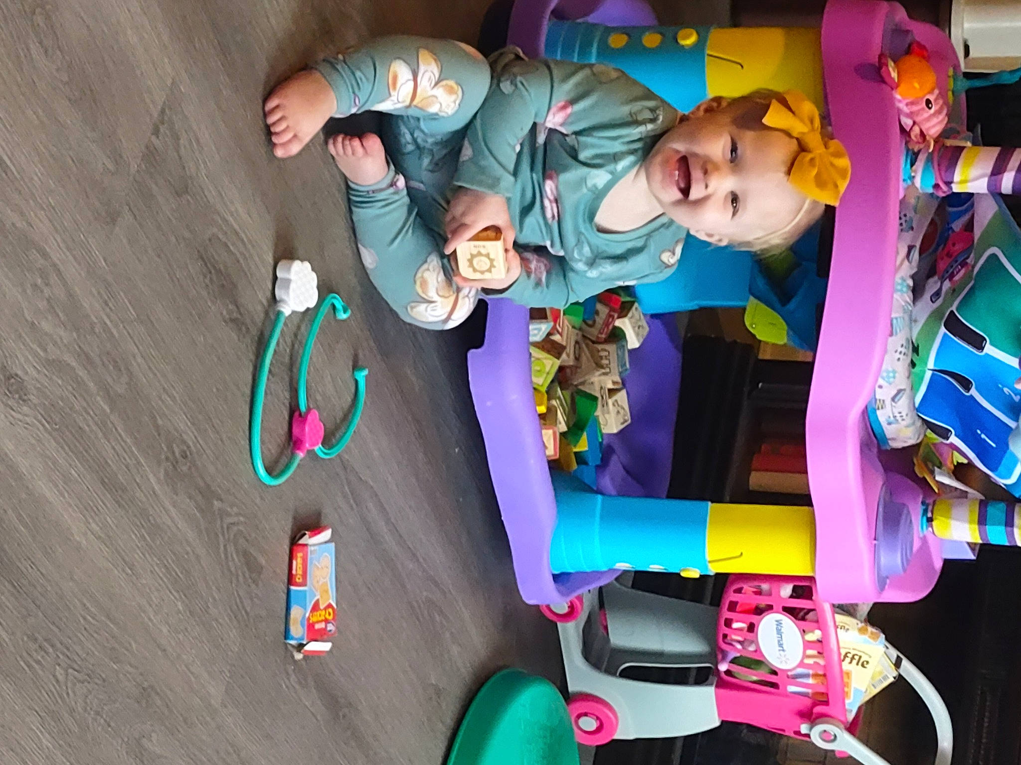 Everly is registered to the contest to win money with this photo: animation, art, bumper, child, cool, fictional_character, fun, games, joy, leisure, magenta, motor_vehicle, person, play, recreation, room, t_shirt, toddler, toy, trunk