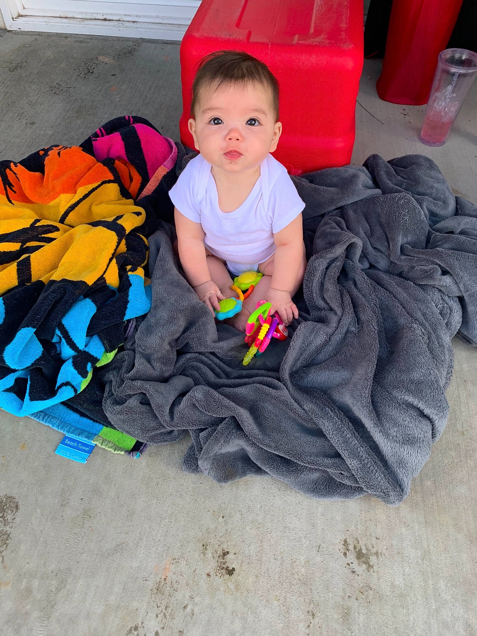 Kalisia is registered to the contest to win money with this photo: child, fun, person, play, sitting, smile, t_shirt, toddler, vacation