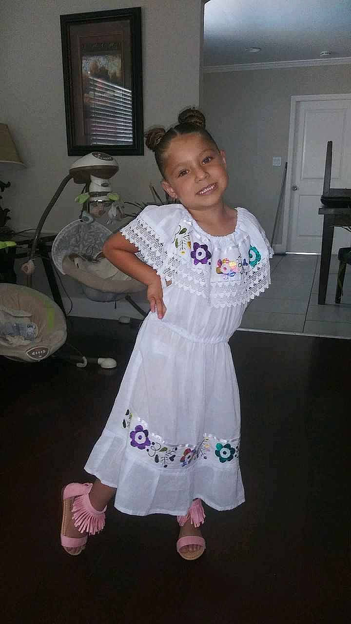 Jaylah is registered to the contest to win money with this photo: child, dress, joy, person, textile, toddler, white