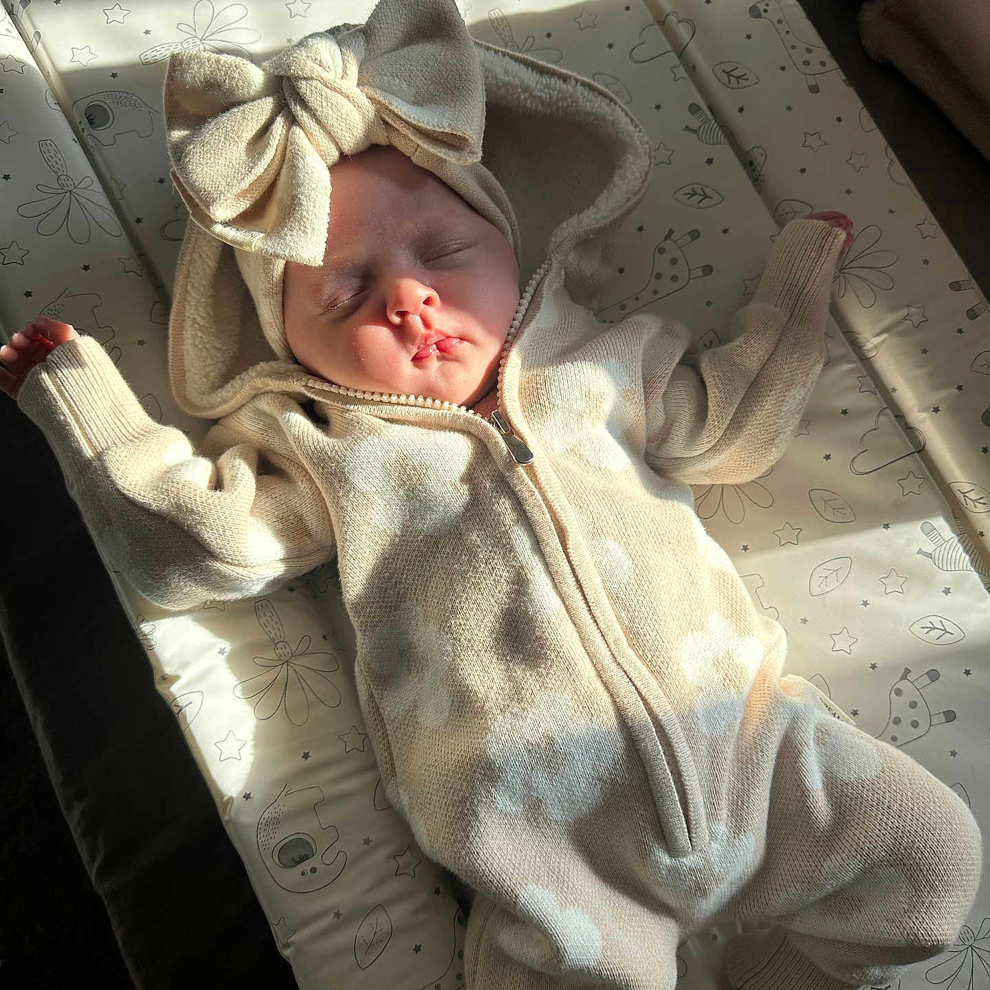Harper joined the competition — help win amazing prizes! baby, bed, bonnet, clothing, cradle, crib, face, furniture, hat, head, hood, hoodie, infantbed, knitwear, newborn, person, photography, portrait, sweater, sweatshirt