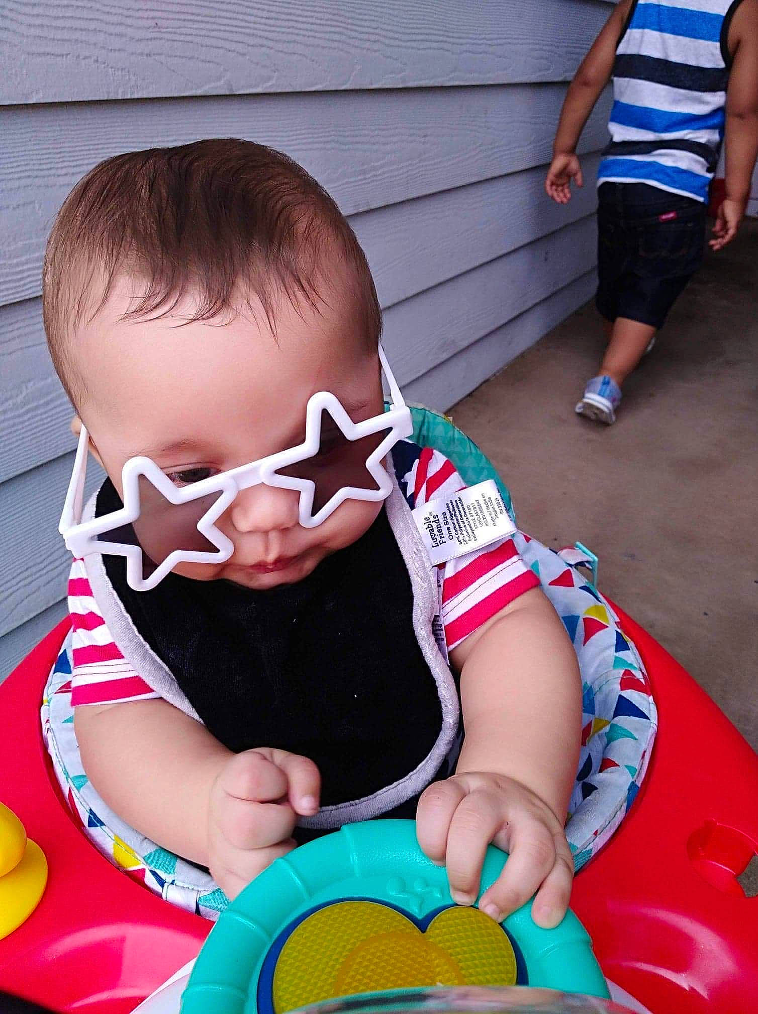 Day'Vonn joined the competition — help win amazing prizes! active_shorts, baby, baby_products, baby_toddler_clothing, baby_toys, bermuda_shorts, child, curious, nail, person, play, shorts, sitting, slipper, sock, toddler, trunks