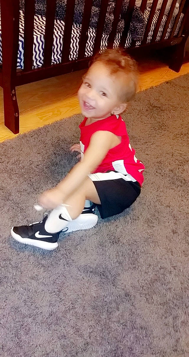 Day'Vonn joined the competition — help win amazing prizes! ankle, baby, baby_toddler_clothing, child, floor, flooring, foot, human_body, joy, lap, person, play, sock, toddler