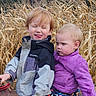 child, children, cornfield, autumn, outdoor, jacket, purple_jacket, playful, serious, siblings, nature, plants, cornstalks, messy_hair, portrait, two_people, young, cute, expression, casual