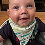 Theo joined the competition — help win amazing prizes! baby, smiling, bib, high_chair, indoor, child, happy, cute, infant, clothing, face, portrait, seated, skin, eyes, mouth, head, cheeks, person, young